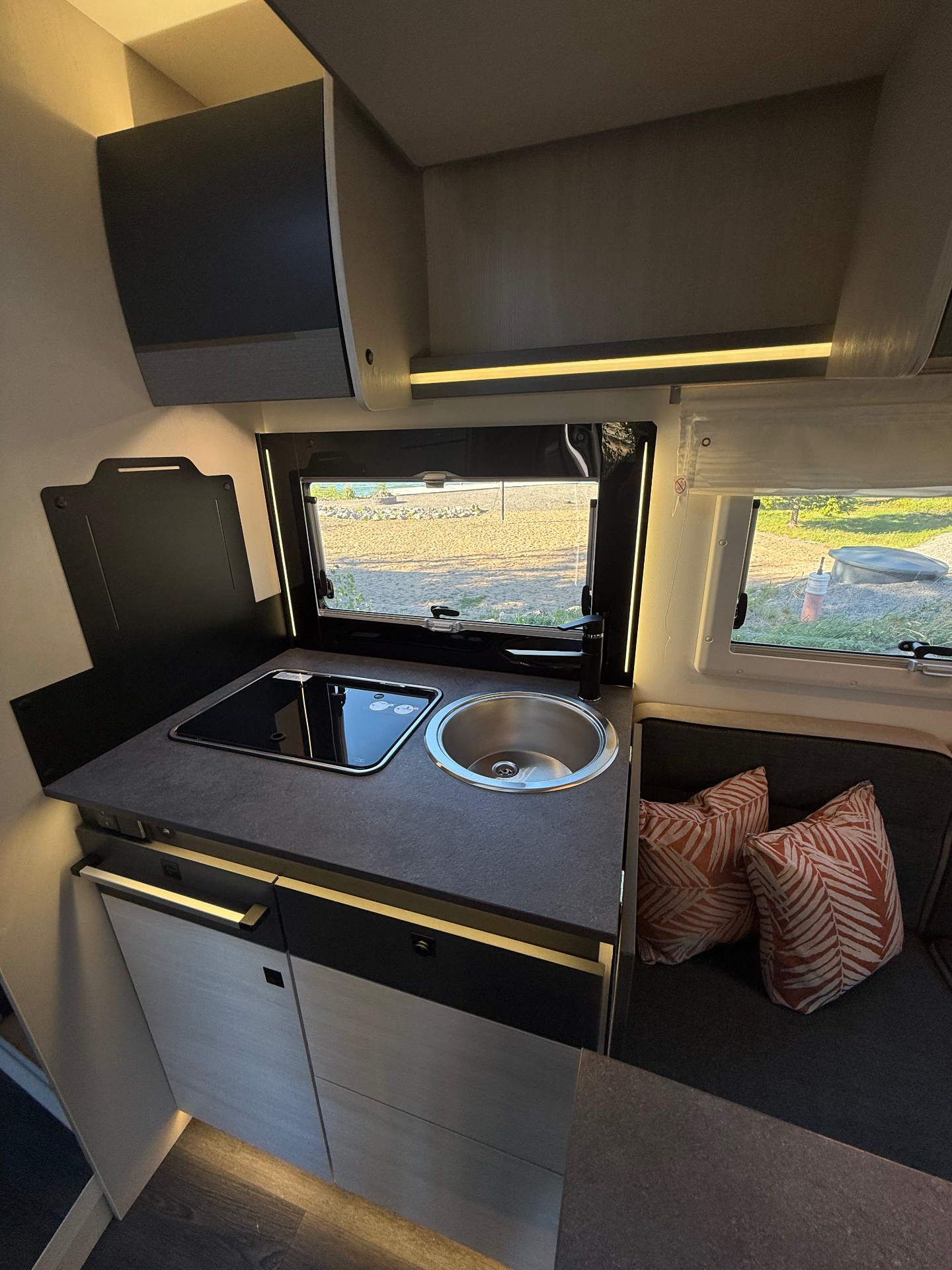 Compact kitchen with induction hob and sink